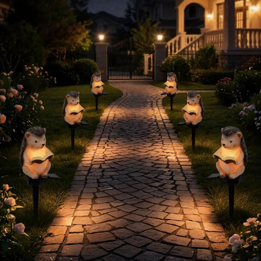 Solar Powered Warm White LED Reading Hedgehog Garden Stake Light - Weatherproof Flower Bed & Yard Lighting