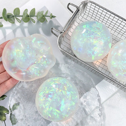 Iridescent Coconut Oil Squishy Stress Relief Ball -  Novelty Sensory Toy Gift